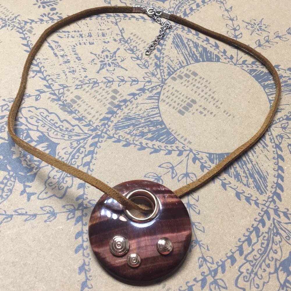 Sterling silver .925 pendant on leather cord